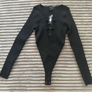 Pretty Little Thing Black Ribbed Bodysuit plunge neck.